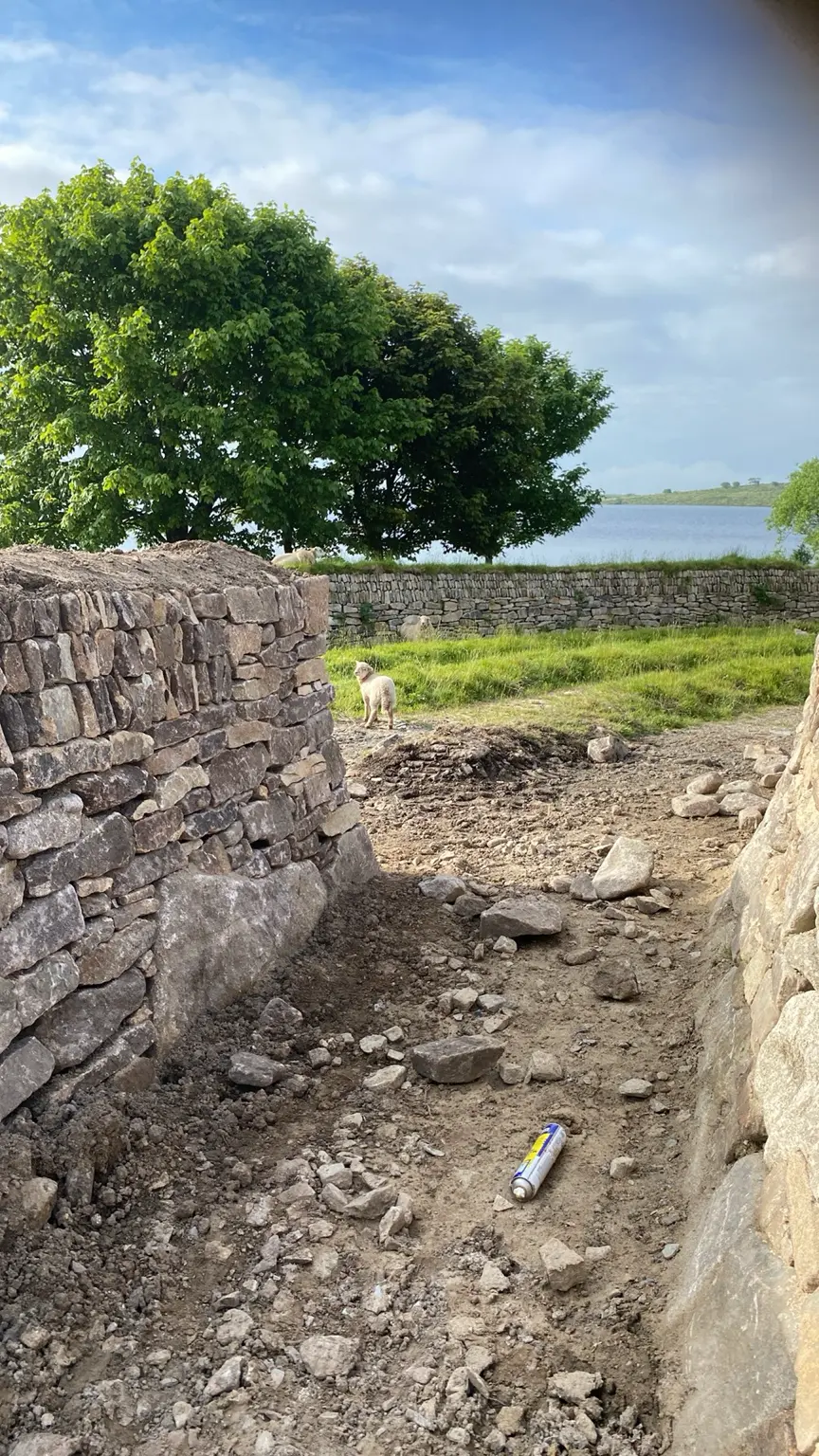 Cornish hedge bank being rebuilt in local stone