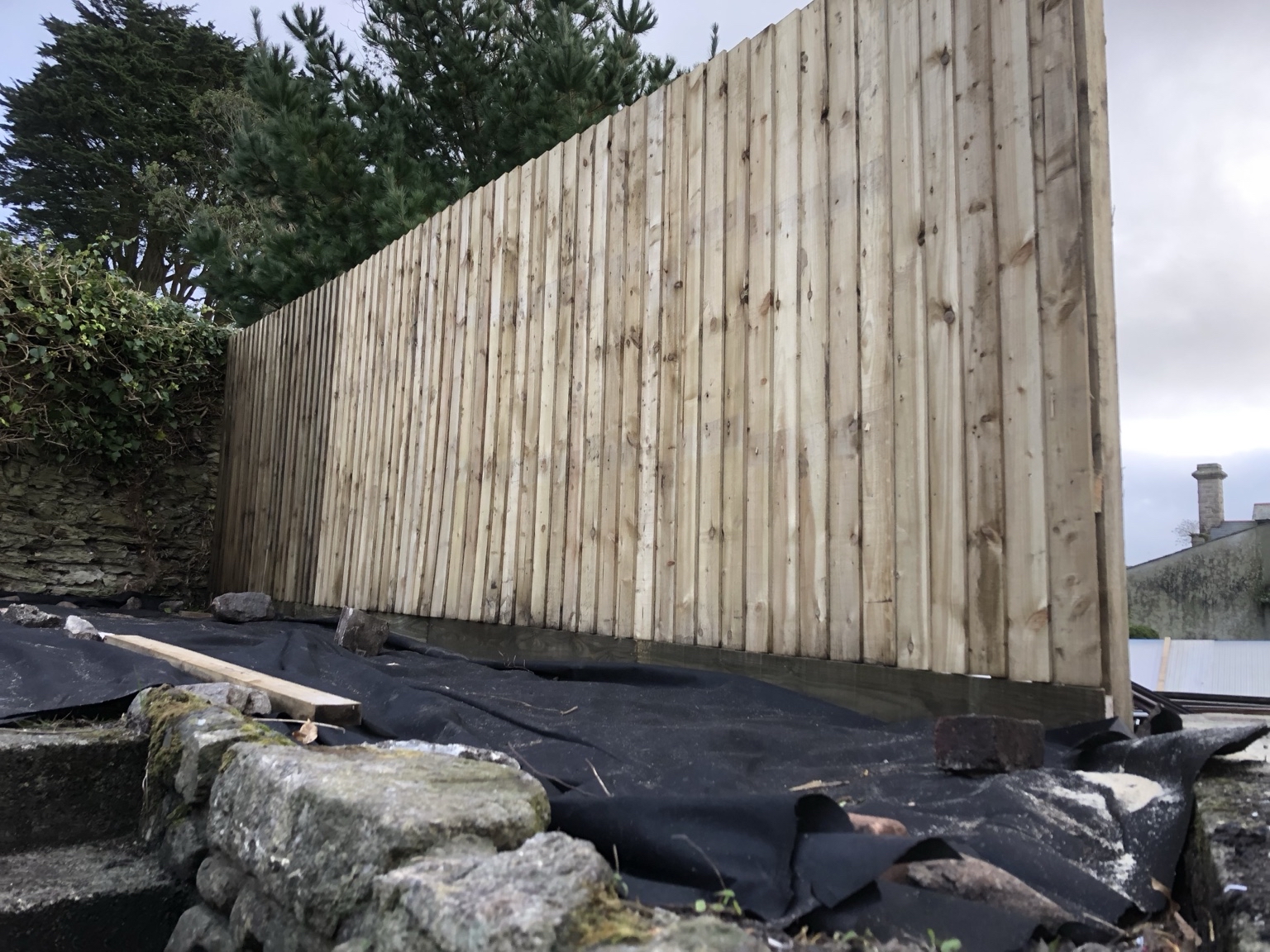 Finished close board timber fence installed in a South East Cornwall garden