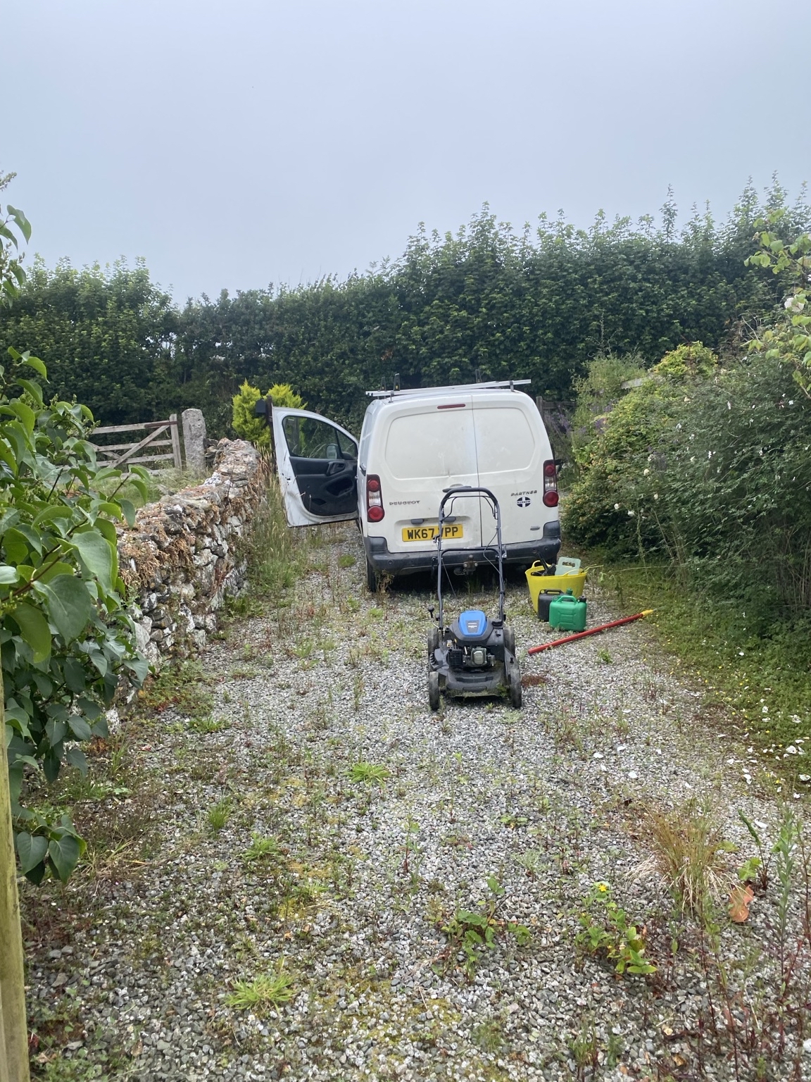Gravel driveway before outdoor maintenance work in South East Cornwall