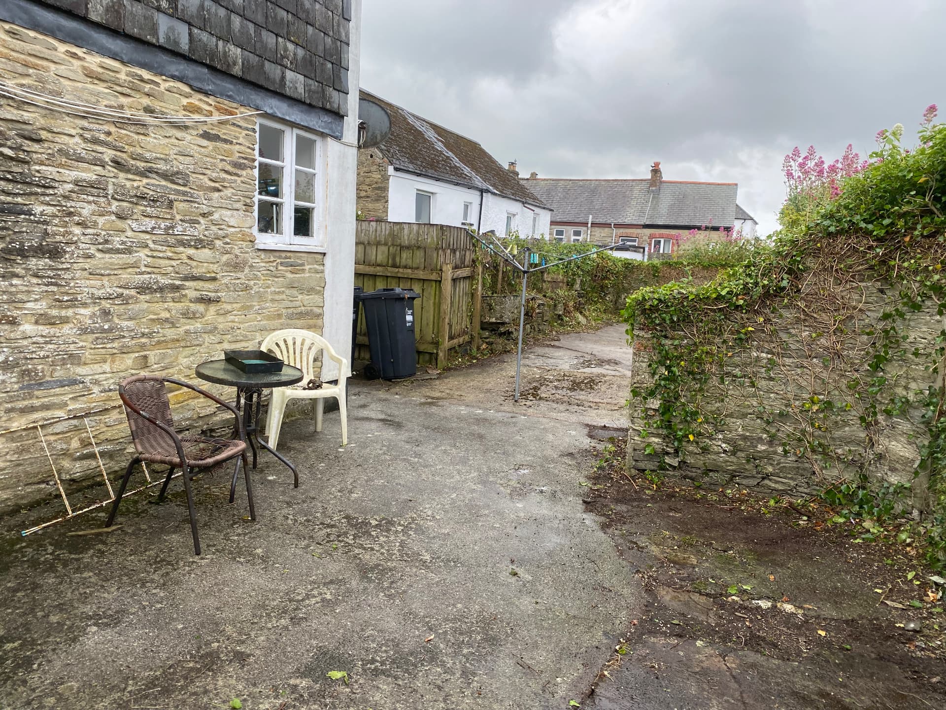 The same stone property garden fully cleared after a garden clearance in South East Cornwall