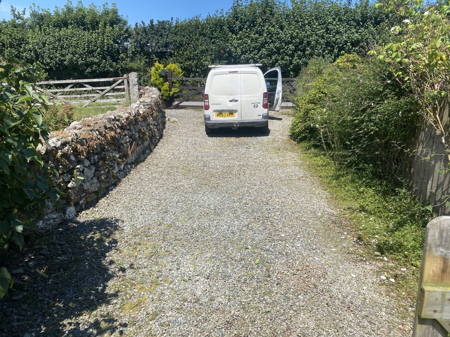Tidied gravel driveway after outdoor maintenance in South East Cornwall